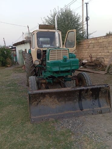 traktor altlıqlı qış çəkmələri: Bu traktor kənd təsərrüfatı işləri üçün uyğundur. Təkərləri mavi — 5