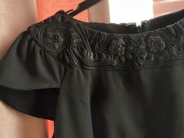 Qara klassik don - Dizayn: Diz boyu, qələm kəsimli siluet. Yuxarı