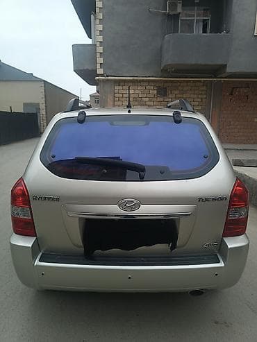 guzgusu: Hyundai Tucson (1-ci nəsil) krossover/SUV - Korpus rəngi: açıq gümüş — 6