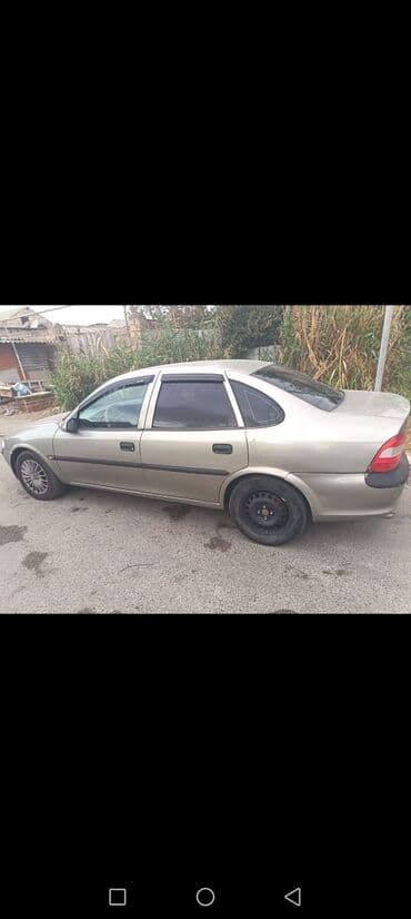 masinim var ag rengi: Opel sedan – komfortlu və praktik gündəlik minik avtomobili. - Kuzov — 6