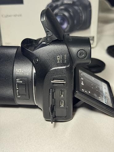 canon powershot a2300 is: Sony Cybershot DSC HX300 20.4 megapixel, 50x optical zoom, 100x — 7