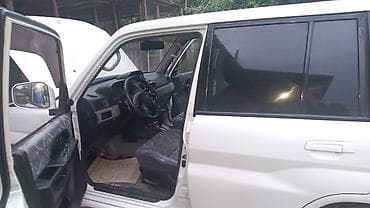 mitsubishi pajero satilir: Mitsubishi Pajero iO, ağ rəngli, 3 qapılı kompakt SUV. Xarici: - Ağ — 4