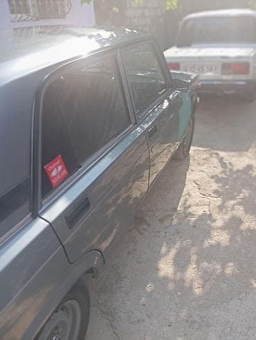 ot bicen traktor satisi: Model: Lada 2107 sedan Rəng: Tünd boz/göy tonları Kuzov: 4 qapı — 7