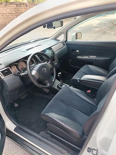 Nissan Tiida hatchback – şəhər üçün ideal, praktik və komfortlu — 2