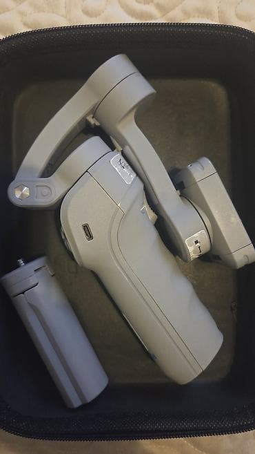 en ucuz kamera: Smartfon stabilizatoru (gimbal) - Model: DJI Osmo Mobile seriyasına — 1