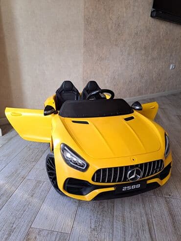детский мотоцикл каталка: Uşaq üçün elektrikli ride-on avtomobil – sarı rəngdə sport kabriolet — 2