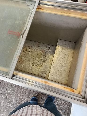 Кухонные вытяжки: Стеклянный морозильник — 5