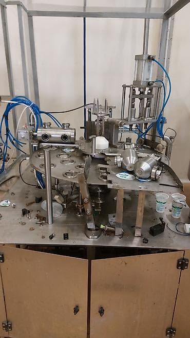 iran peci ustası: Avtomatik stəkan doldurma və qapaqlama makinasinin servis xidmeti — 1