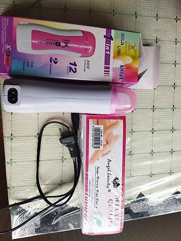 Bu dəstdə tək rulonlu ağ və çəhrayı rəngli mum qızdırıcısı və Angel