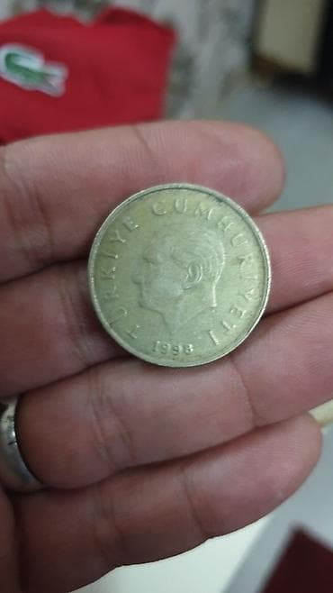 ağ klarnet: Məhsul: 50 Lira sikkə (Türkiyə), 1998 Təsvir: - Növ: Dövriyyə — 2
