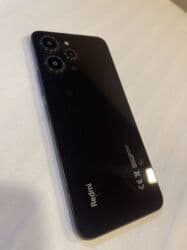 xiaomimi 10256 gb: Xiaomi 12, 128 GB, rəng - Qara, 
 Düyməli, Barmaq izi, İki sim kartlı — 2