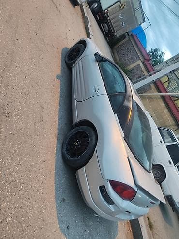 e60 guzgu: Mitsubishi Eclipse kupе (təxmini 2000–2005 buraxılışı) - Korpusu: 2 — 3