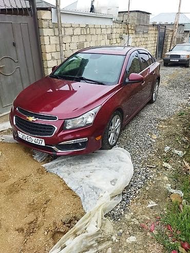 vito disk: Chevrolet Cruze sedan – tünd qırmızı (bordo) rəngdə. Xüsusiyyətlər: - — 2