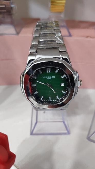 elektrikli saat: Patek Philippe tərzində analoq qol saatları – klassik Nautilus dizaynı — 1