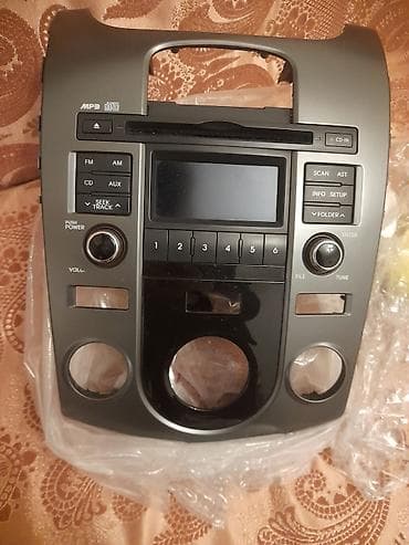 Kia cerato üçün OEM multimedia/radio paneli (ön konsol blok)