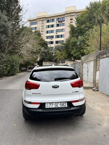 Yağlar və avtokimyəvi maddələr: Kia Sportage SX GDI – ağ rəngli, şəhər və uzun yol üçün komfortlu — 6