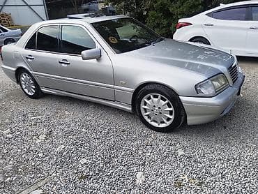 on lip: Mercedes-Benz 240: 2.4 l | 1998 il — 5