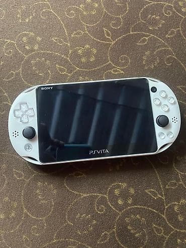 video ceken: Sony playstation slim white Konsol seliqeli istifade olunub Cox ideal — 2