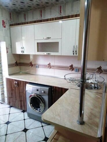 mingecevirde kiraye ev: Xırdalanda Heyder Parkın yaxınlığı Bizim market yanı 5 mərtəbəli — 10