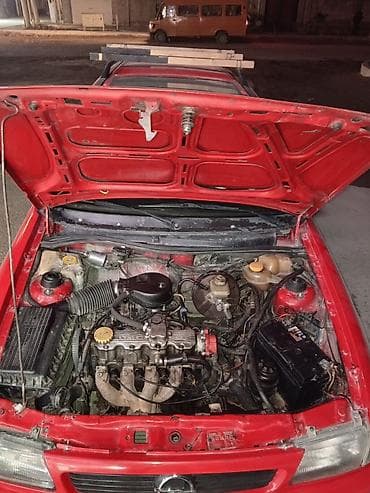 vaz 2107 maşını: Opel Astra F Caravan (universall) – qırmızı rəng. şəxsi sahibiyəm Heç — 9