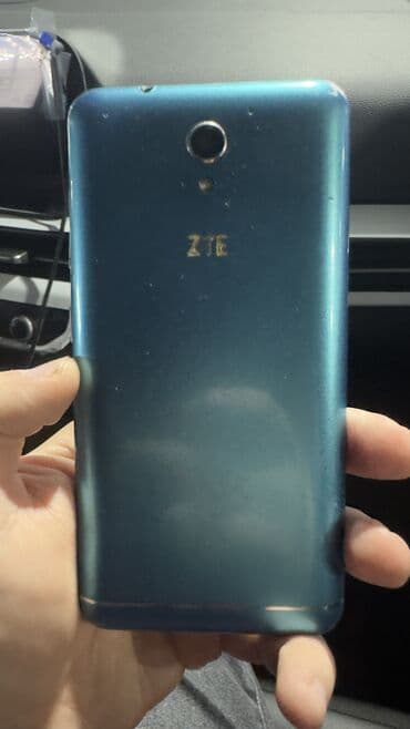 сотовый кнопочный телефон fly ff 281: ZTE v889m, 1 ТБ, цвет - Синий, Кнопочный, Сенсорный, Отпечаток пальца — 4