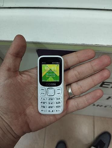 rengli printer: CORN B313 Mini düyməli telefon telefon Xüsusiyyətlər: - Ultra-kompakt — 2