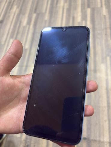 Техника и электроника: Samsung Galaxy A15, 128 ГБ, цвет - Синий, Отпечаток пальца — 2