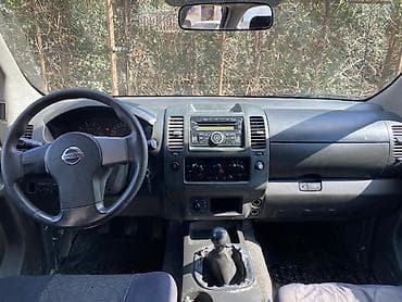 Nissan Navara: 2.5 л | 2012 г. Пикап — 4