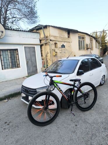 велик купить: Б/у Горный велосипед Strim, 29", скоростей: 18 — 1