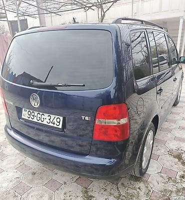 w 202 kapot: Volkswagen Touran, tünd mavi rəng, 5 qapılı kompakt miniven. - Geniş — 7