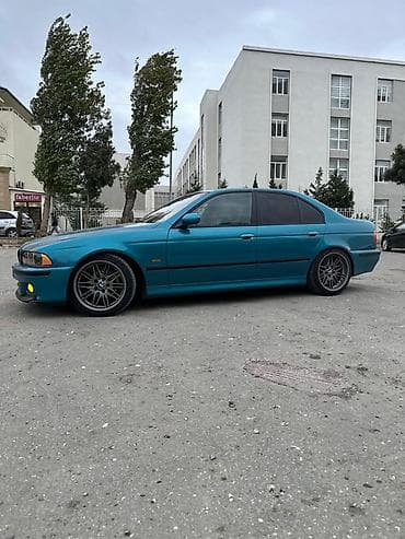 teker cixardan: BMW 5 series: 2.5 l | 1996 il Sedan — 4