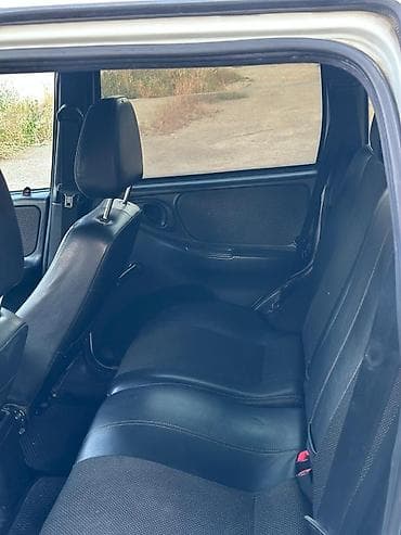 ravon r4 lizing: Chevrolet Niva – kompakt və çevik 4x4 krossover - Kuzov: ağ rəng, tam — 1