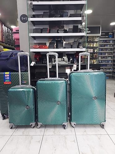 İdman və istirahət: 3’lü sərt korpus səyahət çemodan dəsti – zümrüd-yaşıl rəng - — 1