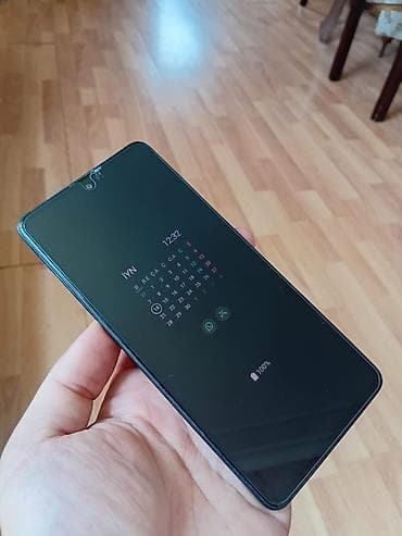 goy su: Samsung Galaxy A71 5G, 128 GB, rəng - Göy, Zəmanət, Düyməli, Sensor — 1