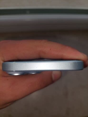 kohne paltaryuyan aliram: IPhone 15, Ağ, Face ID — 4