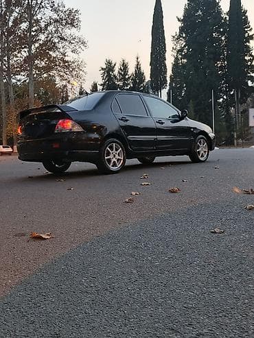 hyundai elantra teker: Mitsubishi Lancer: 1.6 l | 2005 il 290000 km Sedan — 3