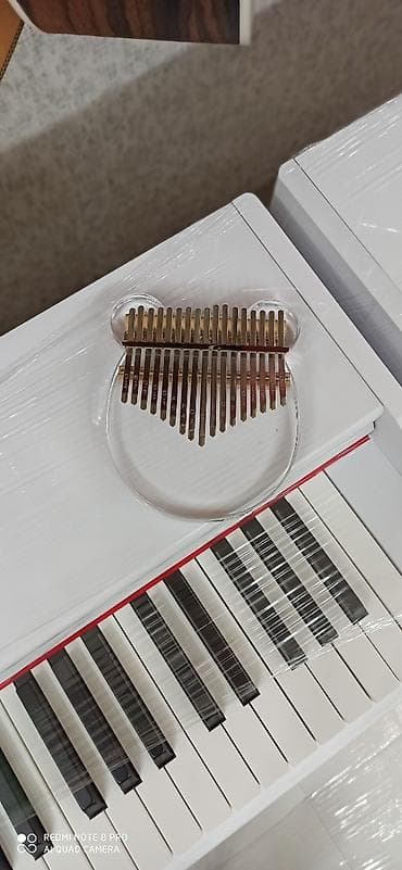 Kalimba Rast musiqi alətləri mağazası. Əhmədli, İnşaatçılar və