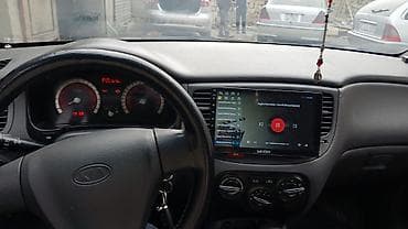 opel astra universal: Kia Rio – hetçbek, qara rəng Xüsusiyyətlər: - Kuzov: 5 qapılı — 4