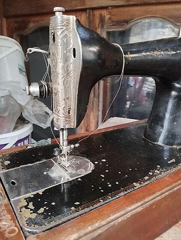 Охота и рыбалка: Mexaniki tikiş maşını – əl fırladan volantlı, taxta əsaslı klassik — 2