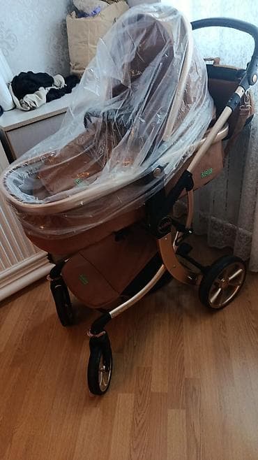 uşaq paltarı: Kidilo araba.qiymet 80 azn. unvan 6 ci mikrarayon. elaqe ucun 050 425 — 3