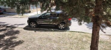 опель зафира а: Şəhər və yüngül off-road üçün uyğun qara rəngli kompakt krossover/SUV — 1