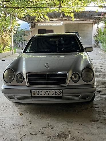 bmw e39 radiator: Mercedes-Benz E-Class (W210) sedan - Gövdə: 4 qapılı sedan, gümüşü — 1