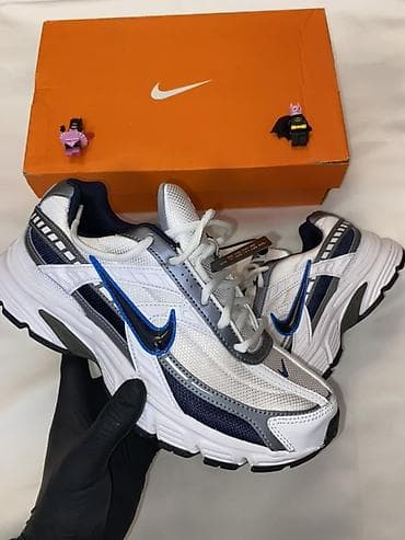 Səndəl və şəp-şüplər: Nike idman ayaqqabısı – model kodu: 394055-101 Xüsusiyyətlər: - Rəng — 4