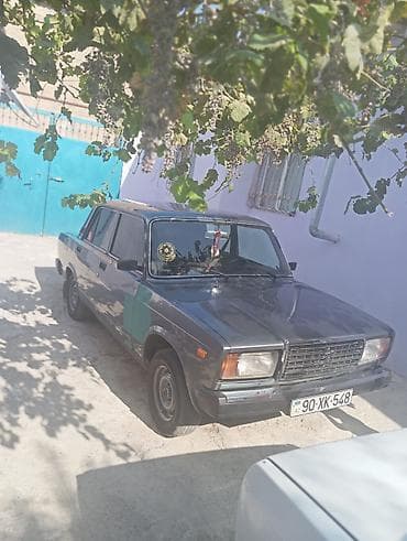 ot bicen traktor satisi: Model: Lada 2107 sedan Rəng: Tünd boz/göy tonları Kuzov: 4 qapı — 9
