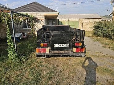 GAZ-24 “Volqa” əsasında yığılmış yük pikapı - Kuzov: Qara rəng, arxa