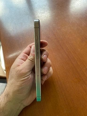 2.el macbook: IPhone 15 Pro, 128 GB, Natural Titanium — 6