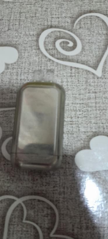 smart saat mi: Elektron siqaret cihazı (pod sistemi) - Kompakt metal gövdə, yuxarıda — 2