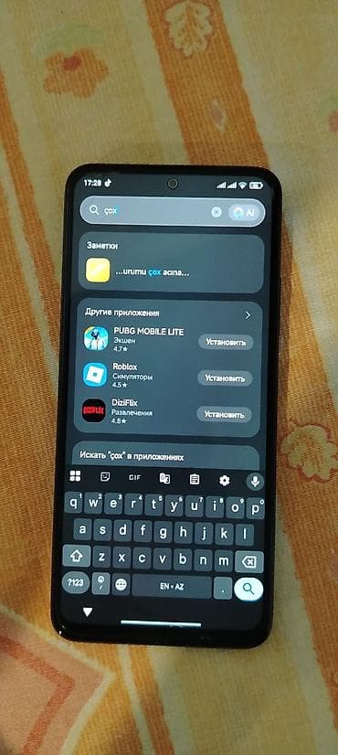 Xiaomi Redmi Note 12 (görsellərdə) - Ekran: 6.67" AMOLED, mərkəzi