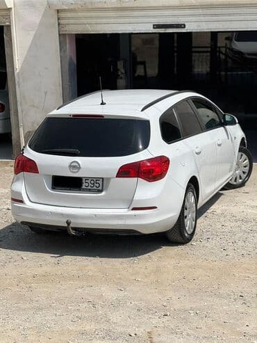 dizel opel astra: Opel Astra: 1.3 l | 2013 il 387523 km Universal — 1