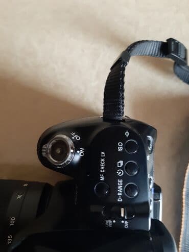 knopkalı: Fotoaparat Sony a500. Probeqi azdır. Şəkil çəkmək üçün knopkası — 12
